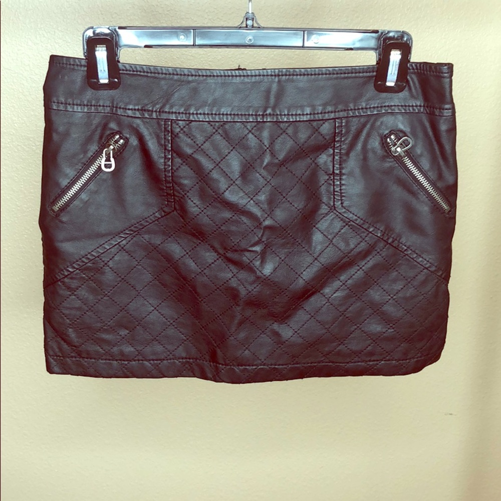 Black leather mini skirt